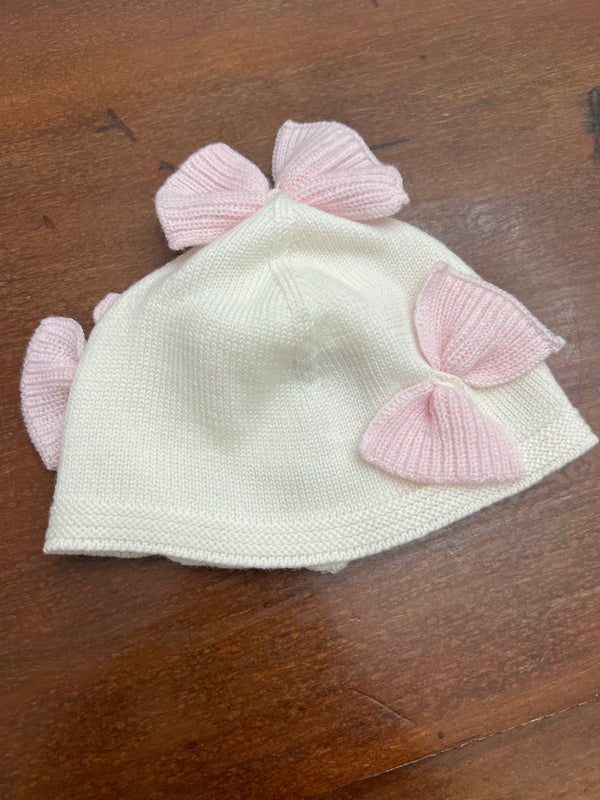 Cappellino in pura lana fiocchi