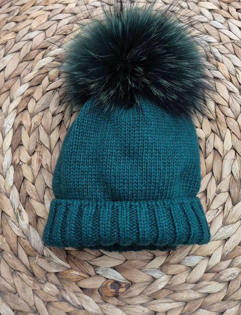 Cappello con pompon in volpe