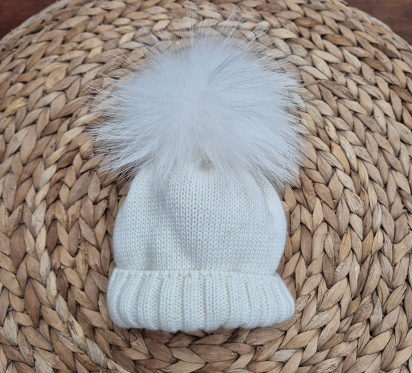 Cappello con pompon in volpe