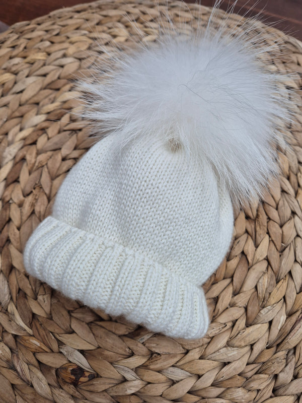 Cappello con pompon in volpe