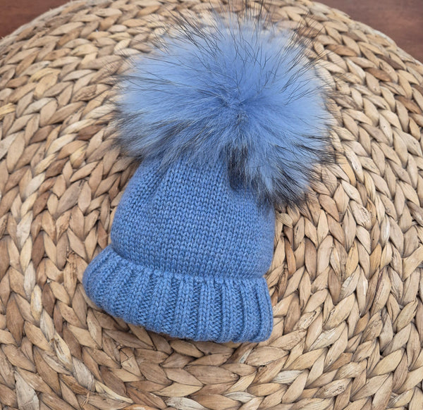 Cappello con pompon in volpe