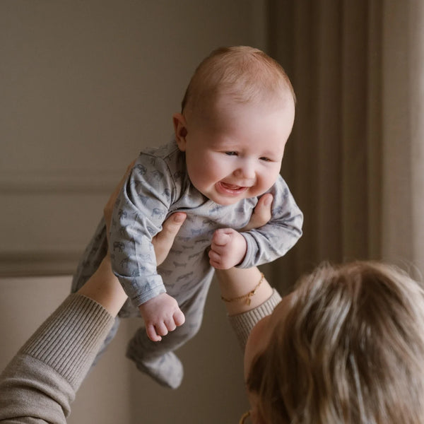 Tutina con babbucce in cotone organico
