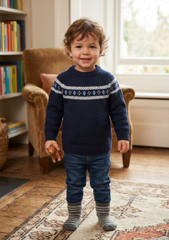 Bambino con pullover blu in lana e cashmere con jacquard