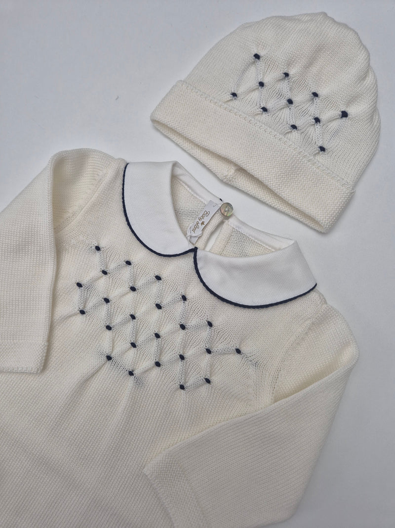 Tutina in pura lana con cappellino e babbucce punto smock