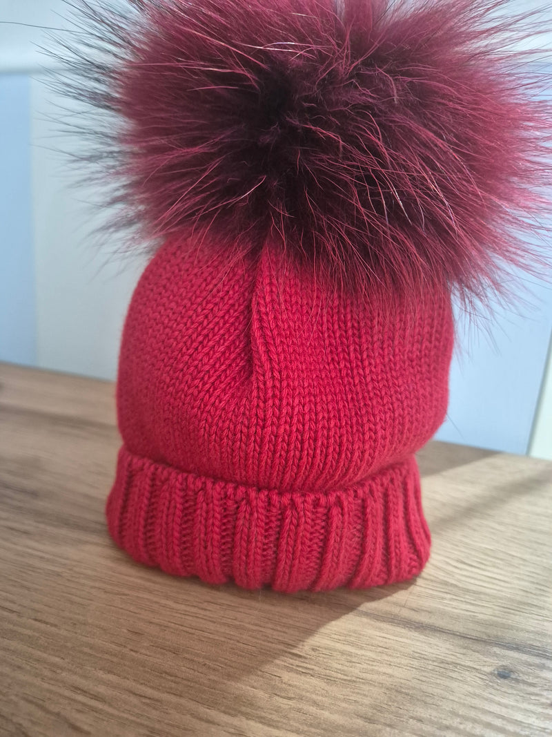 Cappello con pompon in volpe