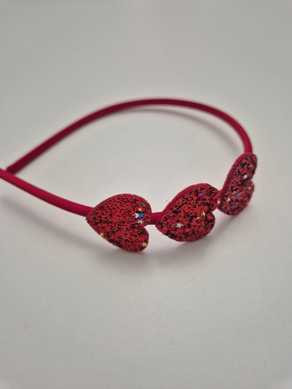 Cerchietto con 3 cuoricini glitterati vari colori