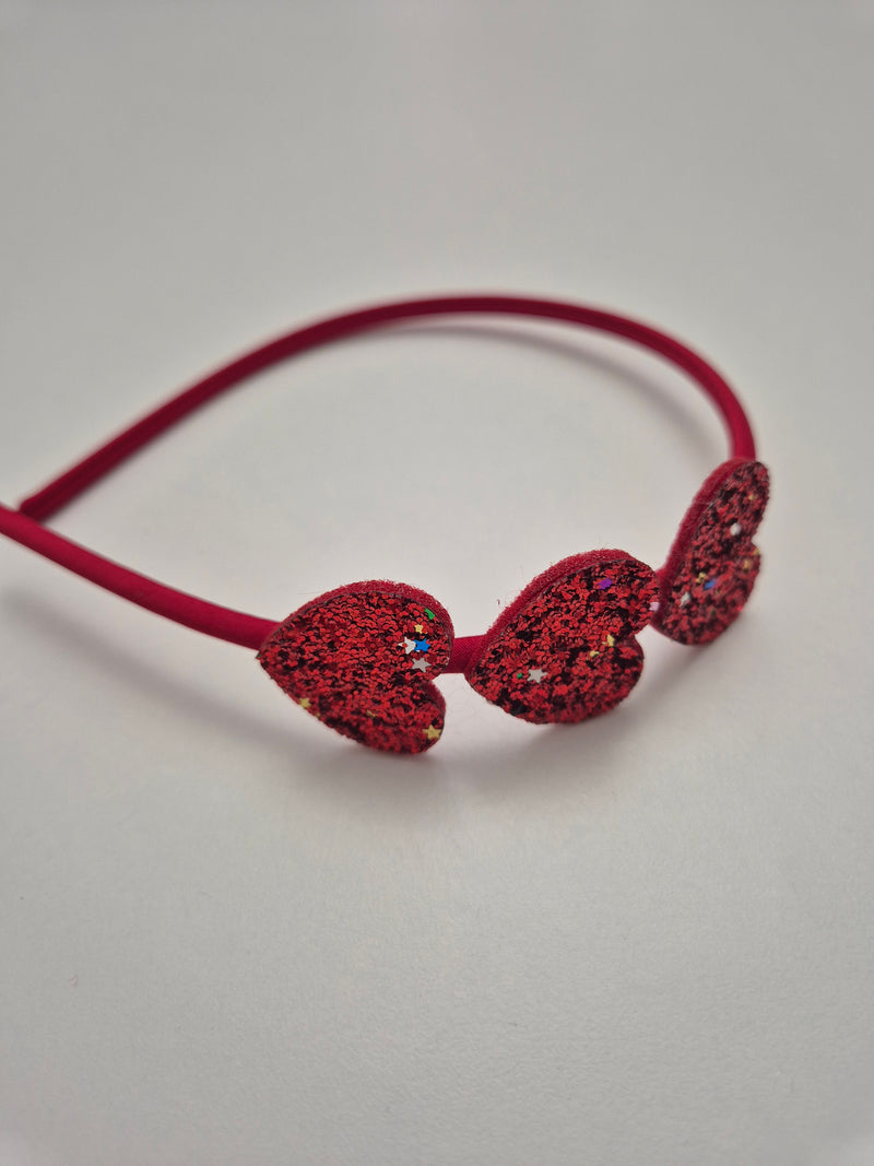 Cerchietto con 3 cuoricini glitterati vari colori