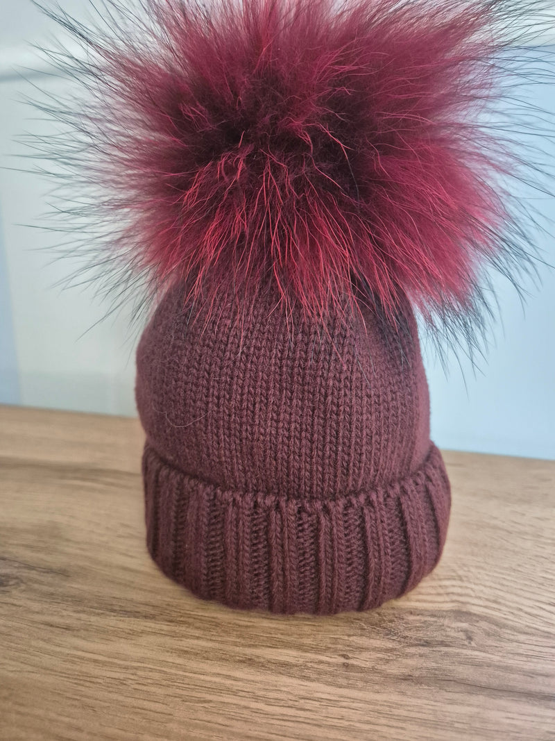 Cappello in lana con pom pon