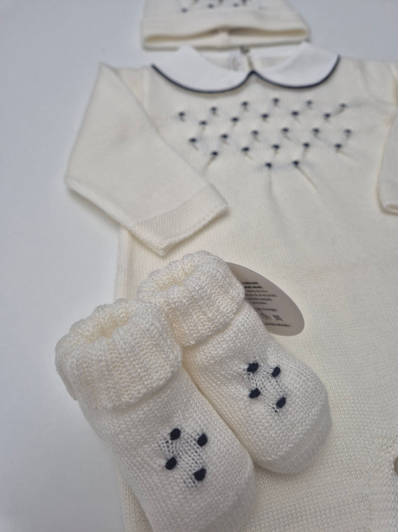 Tutina in pura lana con cappellino e babbucce punto smock