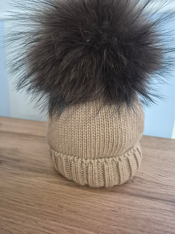 Cappello in lana con pom pon