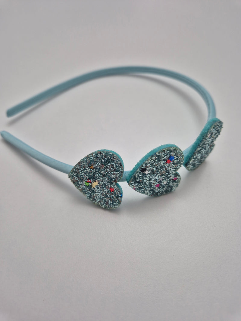 Cerchietto con 3 cuoricini glitterati vari colori
